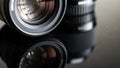 The background is blurred emphasizing the lens s curvature and metallic Royalty Free Stock Photo