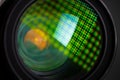 Close-up of a camera mirror lens front lens with aperture and highlights from a light source Royalty Free Stock Photo