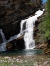 Close Up Of Cameron Falls Pouring Over Rocky Cliff In Waterton Village, Alberta, Canada