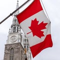 Canadian flag in front of the Notre-Dame Cathedral Basilica in Ottawa, Canada Royalty Free Stock Photo