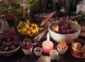 Close up of candle, herbs, flowers and berries Royalty Free Stock Photo