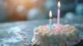 A close-up of a candle-lit cake, ready for the birthday boy or girl to make a wish. Royalty Free Stock Photo