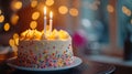 A close-up of a candle-lit cake, ready for the birthday boy or girl to make a wish. Royalty Free Stock Photo