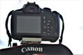 Close up of a Canon digital camera.