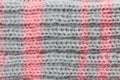 Close-up of a canvas knitted in two colors, background