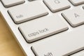 Close up caps lock button on white keyboard Royalty Free Stock Photo