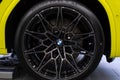 close-up caps of wheel with calipers of BMW car in Studio, crossover model X3 M in Studio, Exterieur vehicle in showroomr, German