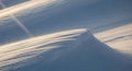 Abstract Snowscape - Wind-Sculpted Drifts in Winter Light Royalty Free Stock Photo