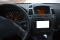 Close-up of car dashboard with mockup on audio system. Royalty Free Stock Photo