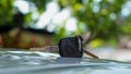 Close up car keys placed on the table, outdoors Royalty Free Stock Photo