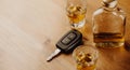 Close up of a car keys and very strong alcohol on the table, do not drink and drive concept Royalty Free Stock Photo