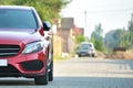 Close up of a car parked on city street side. Urban traffic concept Royalty Free Stock Photo