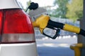 Close up of car refueling at petrol station Royalty Free Stock Photo