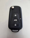 Close up of car remote control on silver background Royalty Free Stock Photo