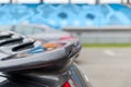 Close up of car spoiler on speedway at stadium Royalty Free Stock Photo