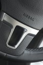 Close up of a car steering wheel airbag Royalty Free Stock Photo