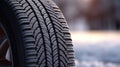 Close up of Car tires in winter on the road covered with snow. Winter tire. Generative Ai