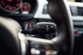 Close-up of car wipers control - modern car interior details, cockpit background Royalty Free Stock Photo