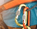 Close-up of carabiners on climbing and mountaineering harness.