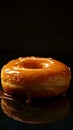 Close-up of a caramel glazed donut with dripping sauce