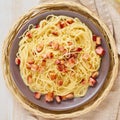 Close up carbonara pasta. Spaghetti with bacon, egg, parmesan cheese and cream sauce. Top view. Traditional italian cuisine Royalty Free Stock Photo