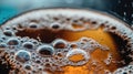 Close-up of carbonated bubbles in dark fizzy drink Royalty Free Stock Photo