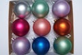 Close up of cardboard package with christmas balls Royalty Free Stock Photo