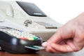 Close-up of cards servicing with POS-terminal Royalty Free Stock Photo