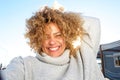 Close up carefree young african american woman smiling outside Royalty Free Stock Photo