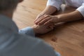 Close up of caring female nurse touch male patient hand Royalty Free Stock Photo