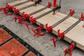 Close up of carpenter fastening board with clamps. Carpentry workshop. Side view Royalty Free Stock Photo