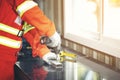 Carpenter hands using electric drill to drills a hole Royalty Free Stock Photo