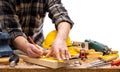 Carpenter at work on wooden boards. Carpentry Royalty Free Stock Photo