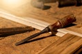 Close-up of a carpenter using a circular saw or a tool Royalty Free Stock Photo