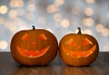 Close up of carved halloween pumpkins on table Royalty Free Stock Photo