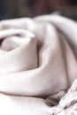 Close up of a cashmere scarf, pink fabric, piece of clothing, woolen texture Royalty Free Stock Photo