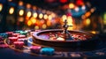 Close up of a casino roulette and stacks of colorful chips