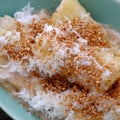 Close up cassava steaming with coconut milk, sesame