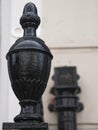 Close-up of cast iron newel post.