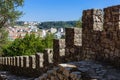 Close-up on a castle defensive wall with the battlements, merlons, crenels or crenellation