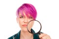 Girl looking at camera showing her acne with magnifier