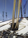 Close up of catamaran ropes. Nautical boat pattern. The trampoline is placed along the inside of the rafters and tensioned with a Royalty Free Stock Photo