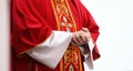 Priest serving Catholic Mass symbols, objects and parts Royalty Free Stock Photo