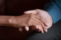 Close up view man holds hand of beloved woman Royalty Free Stock Photo