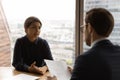 Close up Cauciasian hr manager interviewing confident Indian businesswoman