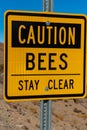 Close up of Caution Bees yellow sign