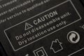 Close-up of CAUTION Warning Label Advising Against Disassembly on Electronic Device Royalty Free Stock Photo