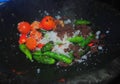 A close up of cayenne pepper, tomatoes, salt, shrimp paste and concoction spices