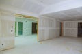 Close up on ceiling construction details with gypsum plaster walls and ceiling of home under construction