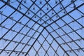 Close up of the ceiling of the metal and glass pyramid at Louvre